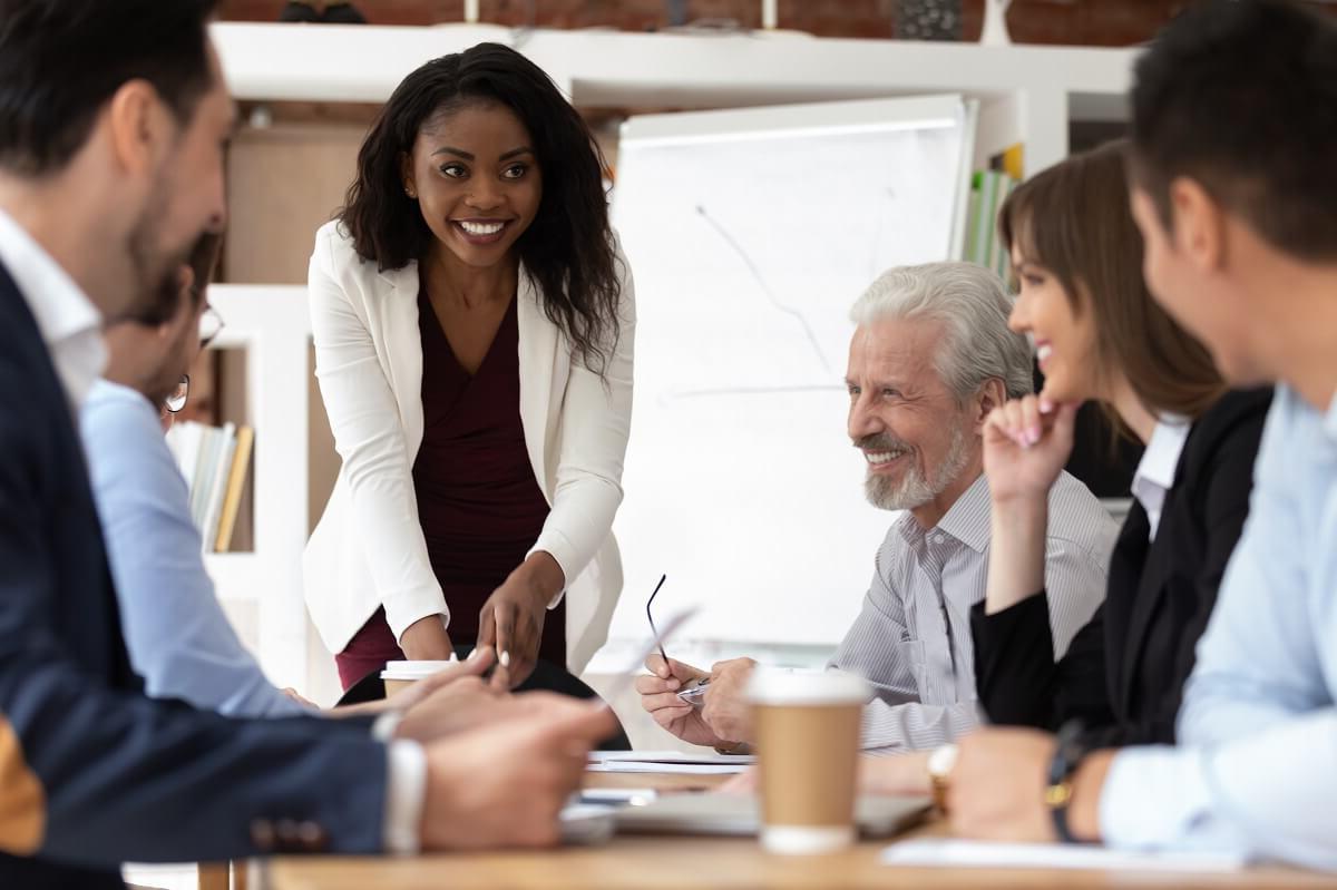 Nurse with MBA Leading Business Meeting